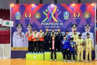 Ketua KONI Kabupaten Pamekasan Djohan Susanto saat mendampingi atlet Taekwondo di GOR Kanjuruhan, Kabupaten Malang, Rabu (18/6/2025).